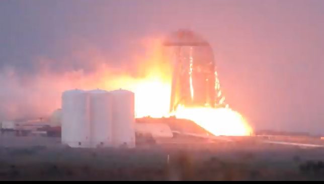 Stainless Starhopper test rocket makes static firings and tethered hops as SpaceX destroys large composite tank tooling